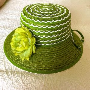 Straw hat in grass green with white accents.